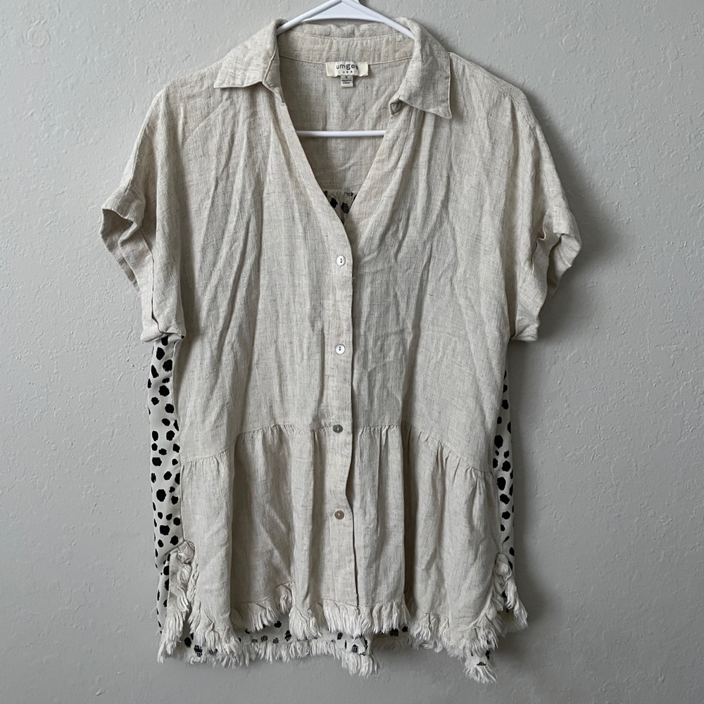 Cream blouse with fringe detail and speckled back